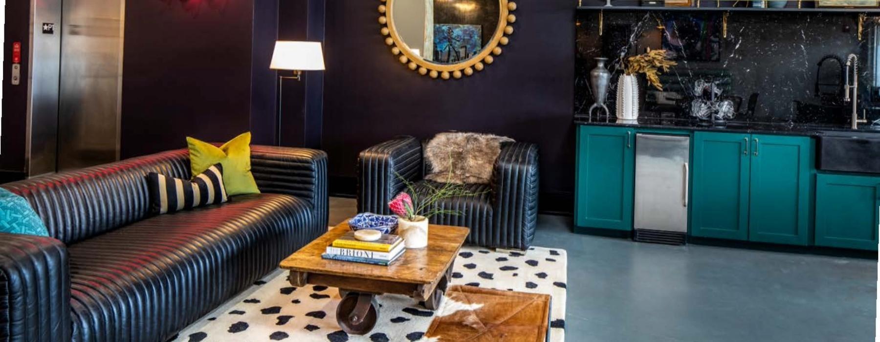 a living room with a couch and a table