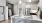 a kitchen with white cabinets