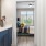 a bathroom with a sink and a bed