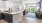 a large kitchen with a large window